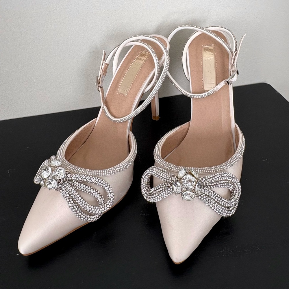 Elegant White Stiletto Heels with Rhinestone Embellishments